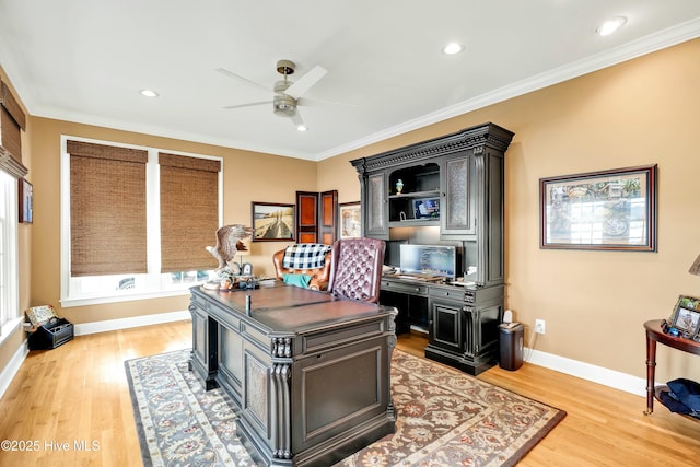 home office with ceiling fan, light hardwood / wood-style floors, and ornamental molding