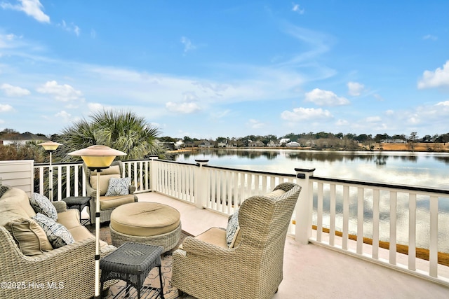 balcony featuring a water view