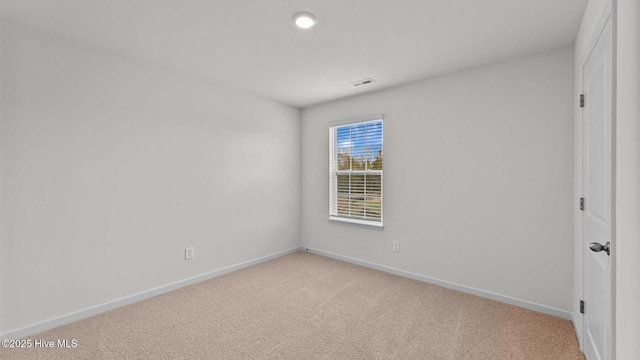 view of carpeted spare room