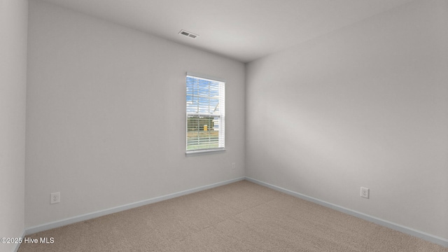 empty room featuring carpet