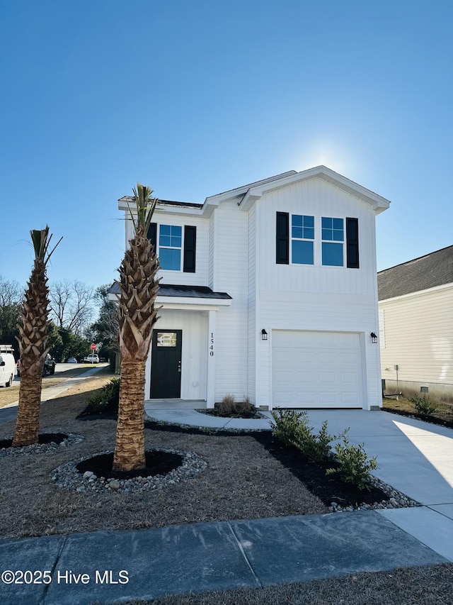 front of property featuring a garage