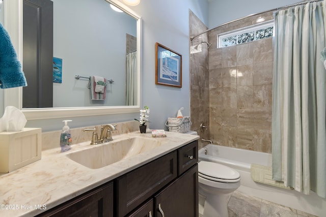 full bathroom featuring vanity, toilet, and shower / bath combo with shower curtain