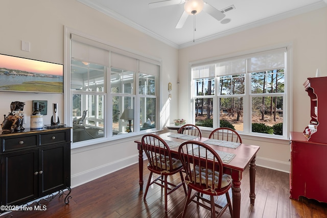 dining room featuring ornamental molding, ceiling fan, and dark hardwood / wood-style flooring