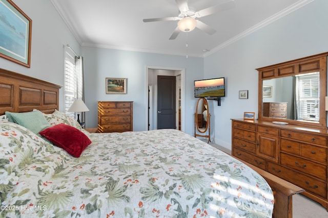 bedroom with ornamental molding and ceiling fan