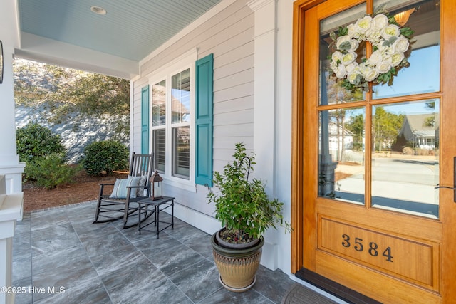 entrance to property with covered porch