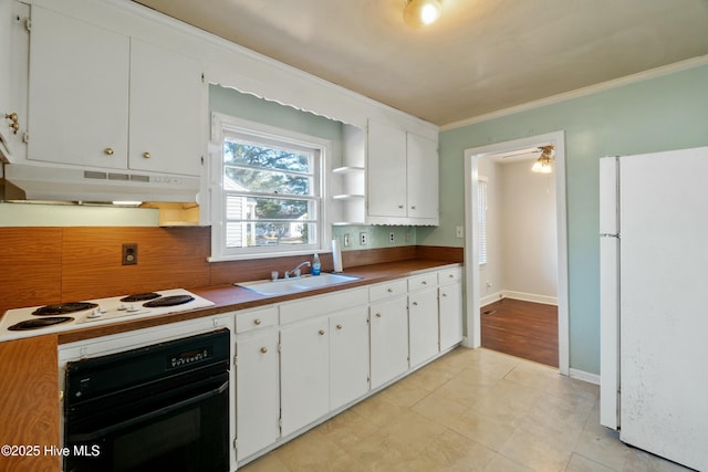 kitchen featuring crown molding, sink, white appliances, and white cabinetry