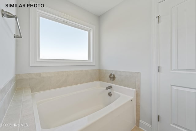 bathroom featuring a bath