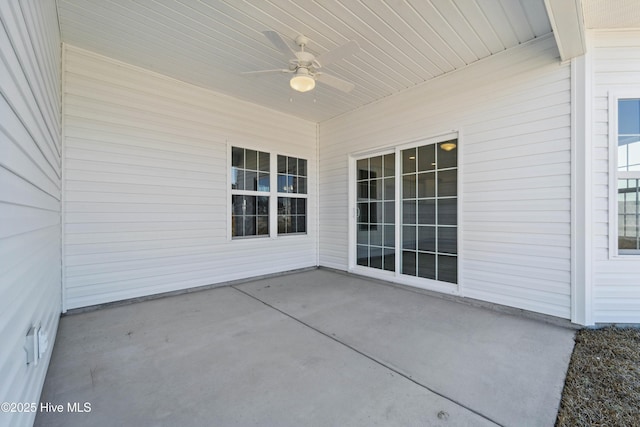 view of patio featuring ceiling fan