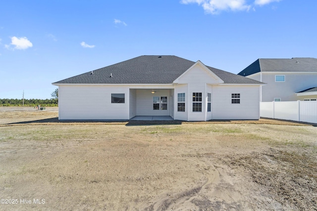 rear view of house with a patio