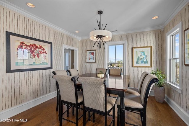 dining space featuring crown molding, a wealth of natural light, and dark hardwood / wood-style floors