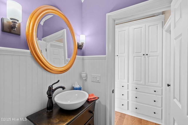 bathroom featuring vanity and hardwood / wood-style flooring