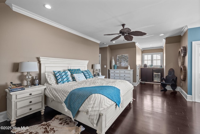 bedroom featuring dark wood-type flooring, ceiling fan, and crown molding