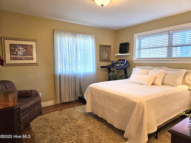 bedroom featuring hardwood / wood-style flooring