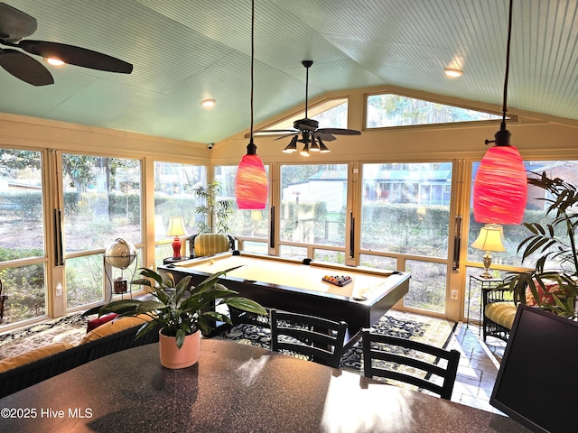 sunroom with ceiling fan, pool table, and vaulted ceiling