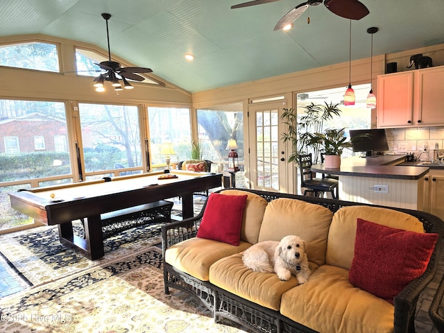 interior space with vaulted ceiling, ceiling fan, pool table, and plenty of natural light