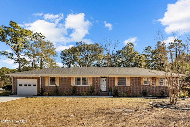 ranch-style house with a front yard and a garage