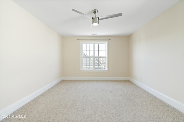 unfurnished room with ceiling fan