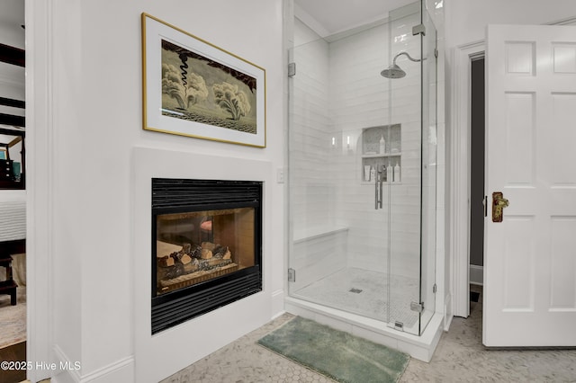 bathroom featuring tile patterned flooring and a shower with door