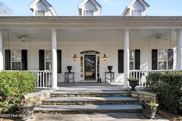 property entrance with ceiling fan and covered porch