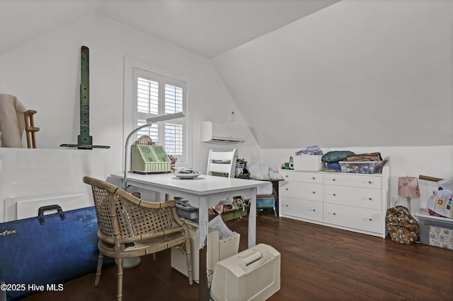 office area with vaulted ceiling, dark wood-type flooring, and an AC wall unit