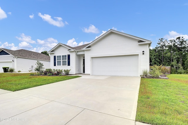 ranch-style home with a front yard and a garage