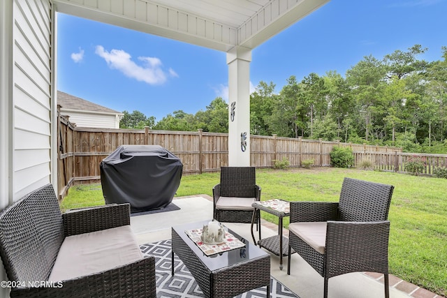 view of patio / terrace with a grill and an outdoor living space