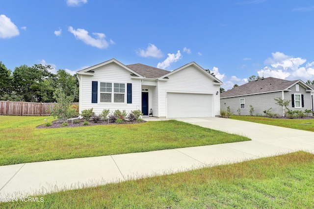 ranch-style home with a front yard and a garage