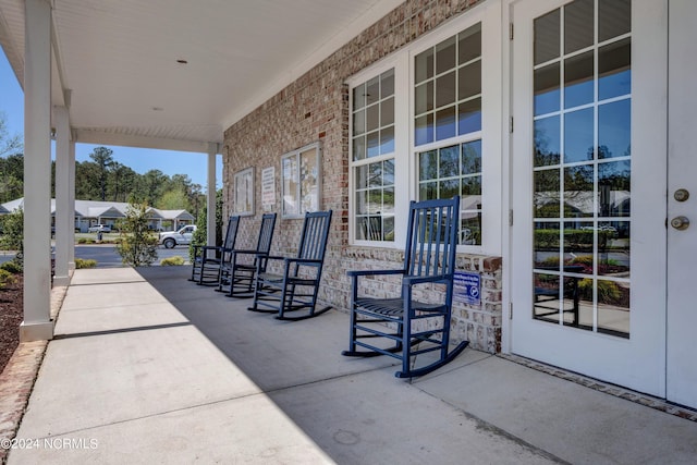 view of patio featuring a porch