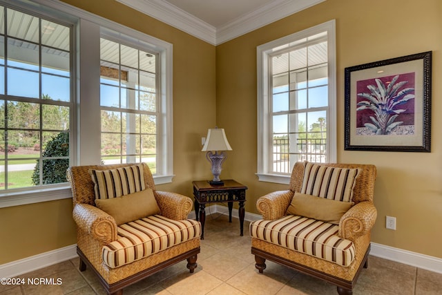 sitting room featuring crown molding, a wealth of natural light, and light tile patterned floors