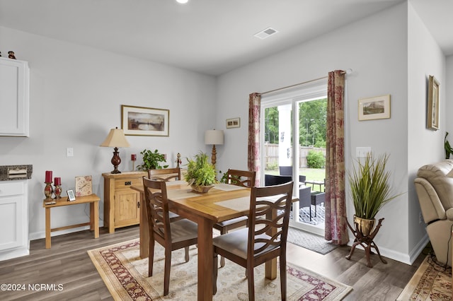 dining room featuring dark wood-type flooring