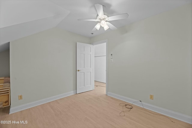 additional living space with vaulted ceiling, ceiling fan, and light hardwood / wood-style floors