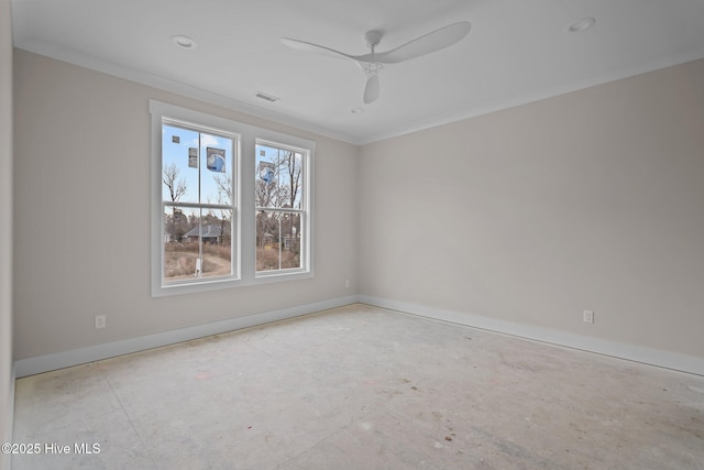 spare room with baseboards, visible vents, ornamental molding, and a ceiling fan