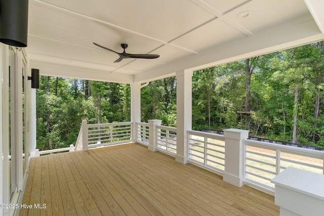 629 Vale Dr, Wilmington, NC 28411 - wooden terrace with view of wooded area and a ceiling fan