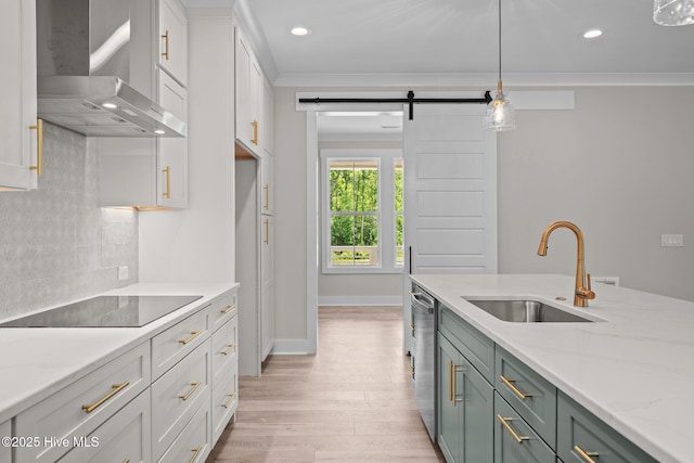 629 Vale Dr, Wilmington, NC 28411 - kitchen featuring a sink, wall chimney range hood, black electric cooktop, recessed lighting, and stainless steel dishwasher