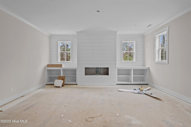 unfurnished living room with visible vents, plenty of natural light, ornamental molding, and baseboards
