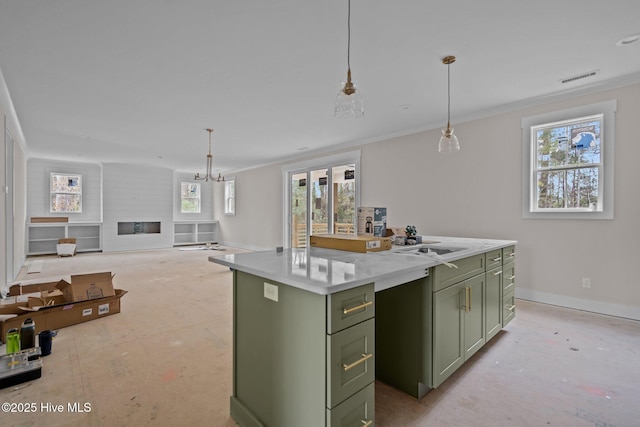 kitchen featuring visible vents, a wealth of natural light, and green cabinets
