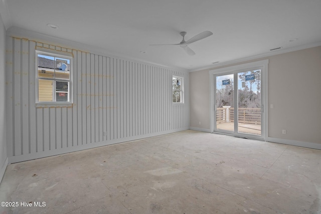 spare room featuring crown molding and ceiling fan