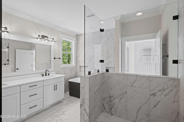 629 Vale Dr, Wilmington, NC 28411 - bathroom featuring marble look tiles, a marble finish shower, a freestanding bath, double vanity, and crown molding