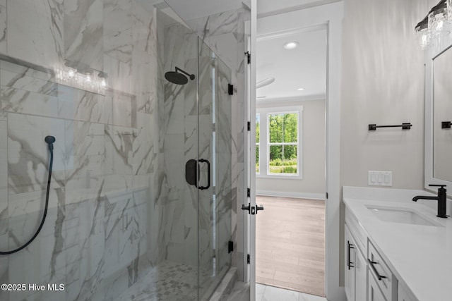 629 Vale Dr, Wilmington, NC 28411 - full bathroom with vanity, a marble finish shower, recessed lighting, and baseboards