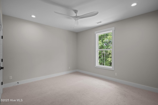 629 Vale Dr, Wilmington, NC 28411 - unfurnished room with light colored carpet, ceiling fan, baseboards, and recessed lighting
