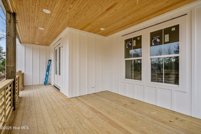 wooden terrace with a porch