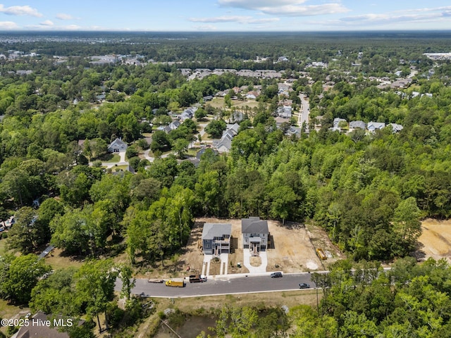 bird's eye view featuring a view of trees