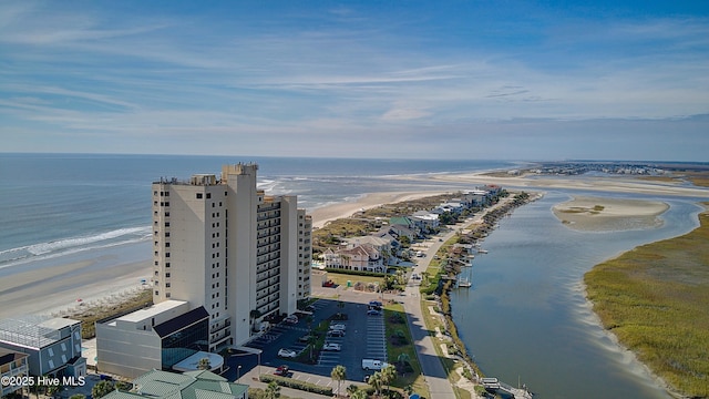 drone / aerial view with a view of the beach and a water view