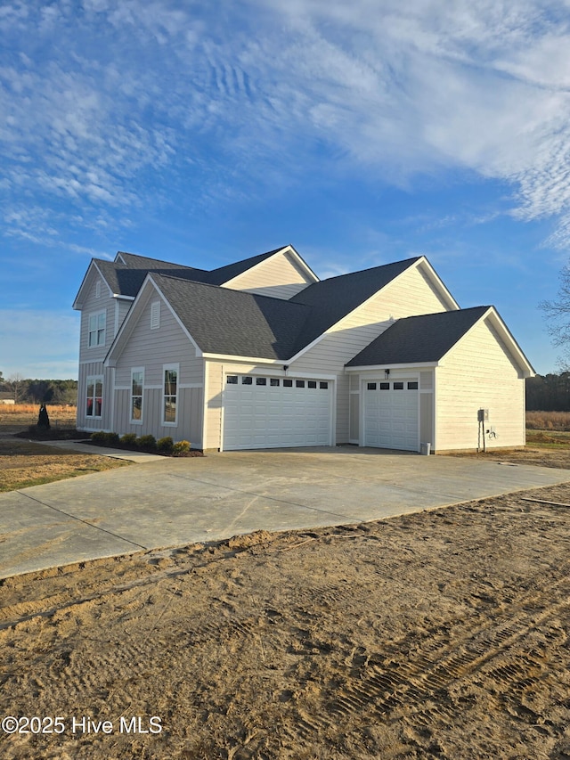 view of front of house featuring a garage and driveway