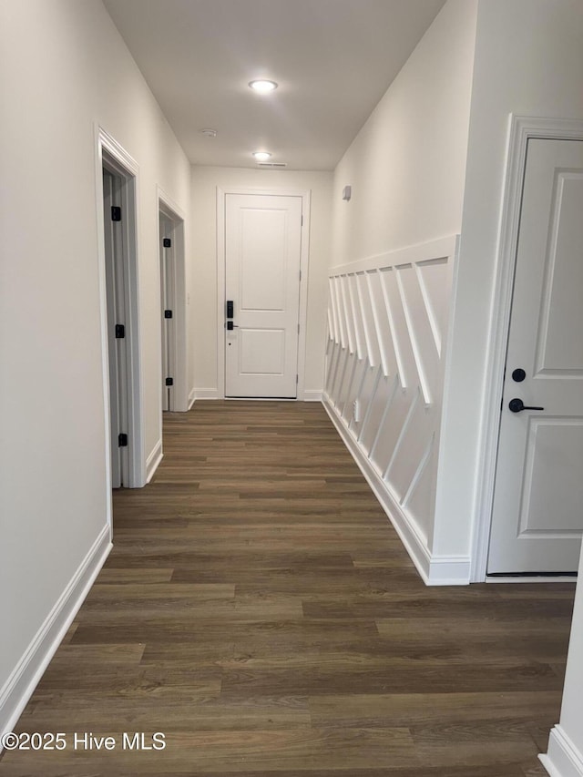 4158 Dixon Rd, Grimesland, NC 27837 - corridor featuring dark wood-style floors and baseboards