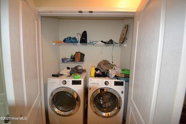 laundry room featuring separate washer and dryer