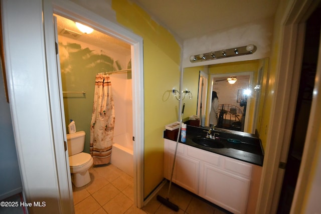 full bathroom featuring tile patterned flooring, vanity, toilet, and shower / bathtub combination with curtain