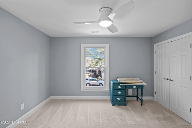 miscellaneous room featuring baseboards, visible vents, ceiling fan, and carpet flooring