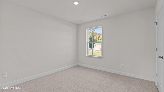 view of carpeted spare room