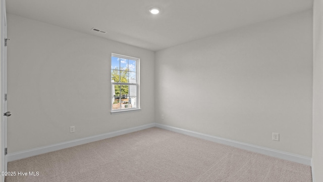 view of carpeted spare room